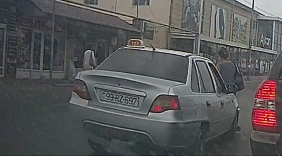 bakida-qadin-zerbeden-havaya-uchdu-video