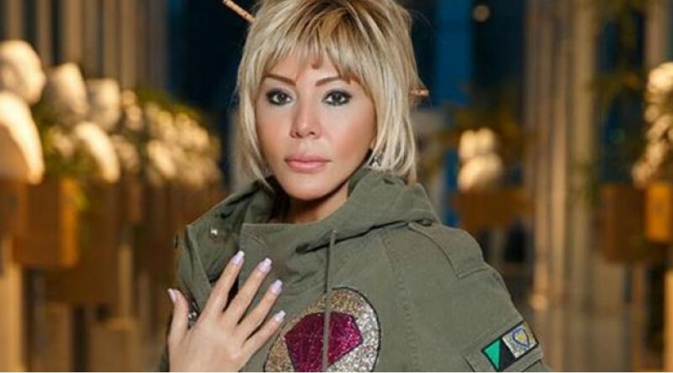kuchede-silahla-gezen-xanim-xalq-artistinden-shok-sozler