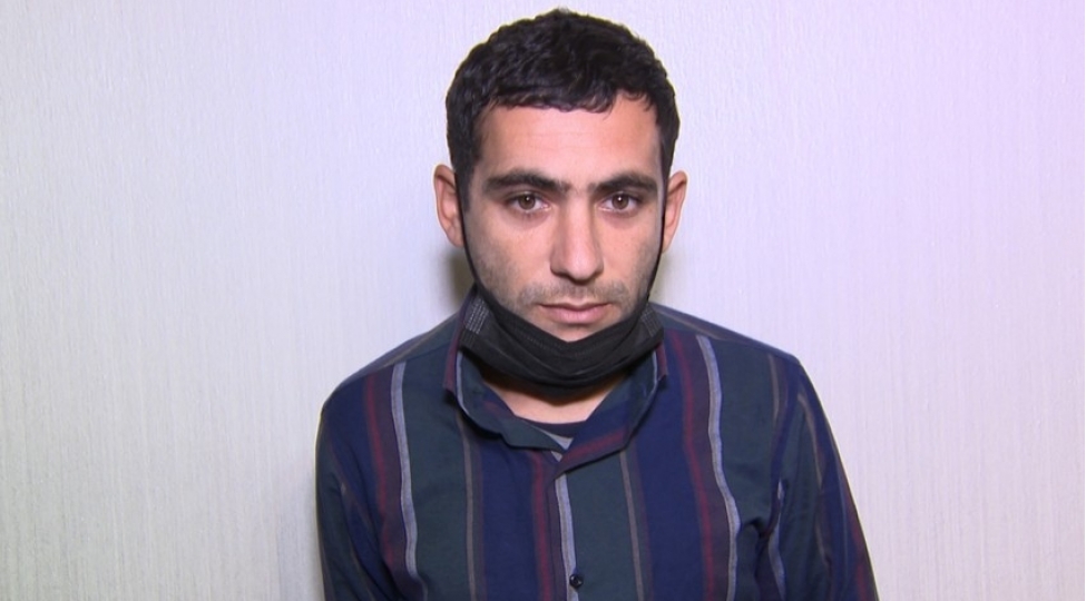 taksi-surucusuneqarshi-soygunchuluq-eden-mushteri-saxlanilib-video