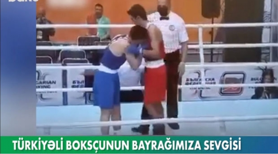 azerbaycanli-reqibine-qalib-gelib-azerbaycan-bayragini-opdu