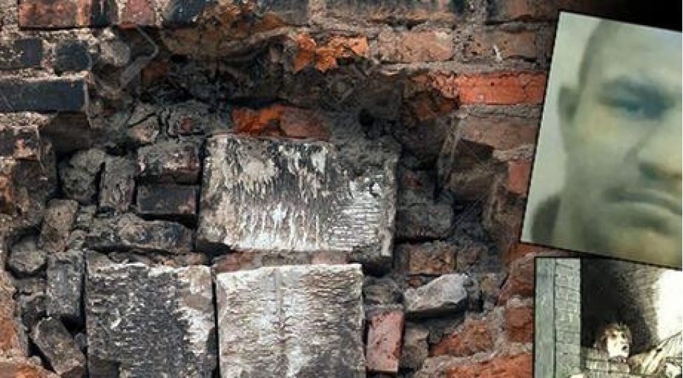 sheherin-merkezinde-uzerine-divar-horulub-foto