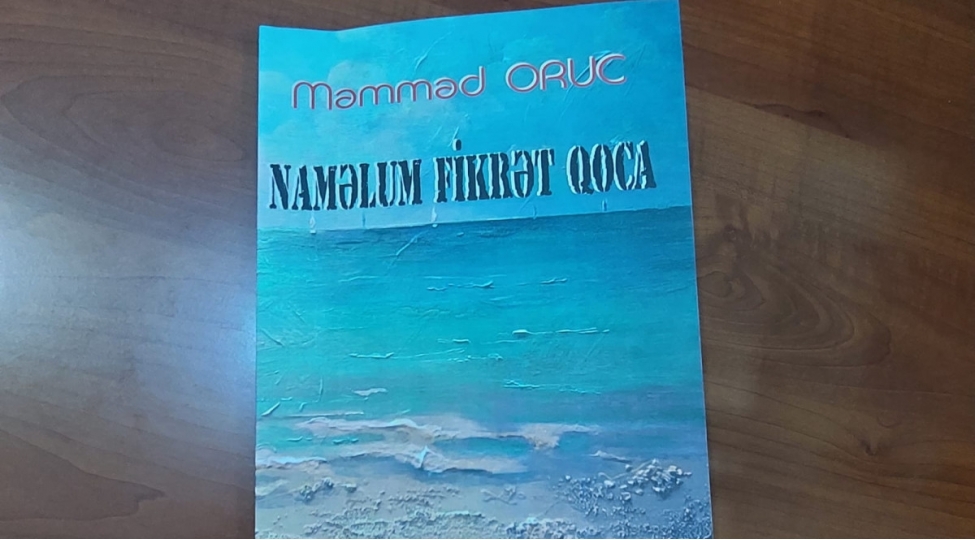 yazichi-memmed-oruc-fikret-qocadan-kitab-yazib